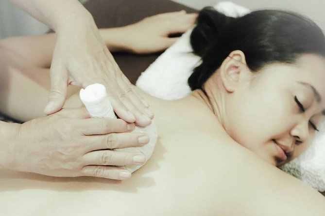1.5 Hours Traditional Thai Massage with Herbal Compress - Free Transportation - The foot cleansing begins the treatment