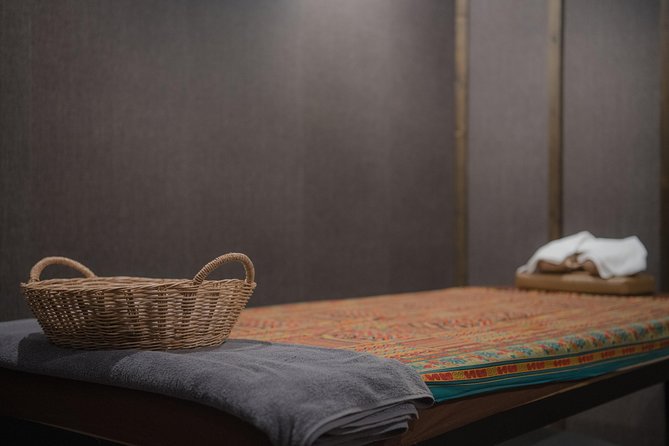 1 Hour Deep Tissue Thai Massage with Balm - Free Transportation - A cool towel, tea, and clean clothes