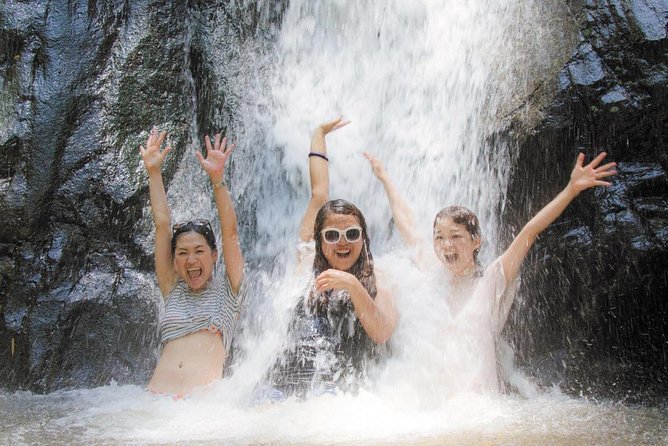10KM Inflatable Kayaking and 3HR Trekking Adventure - Swimming beneath a 10-meter waterfall