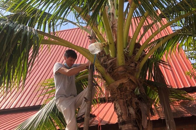 Amphawa Boat Ride & Railway Market: Multi-Lang Private Tour - Wat Bang Kung and its banyan-covered chapel