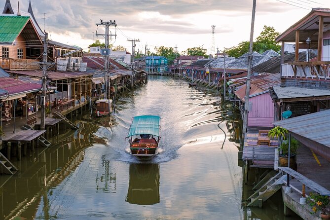 Amphawa Floating Market & Maeklong Railway Train Market Tour - Wat Bang Kung and its tree-covered shrine