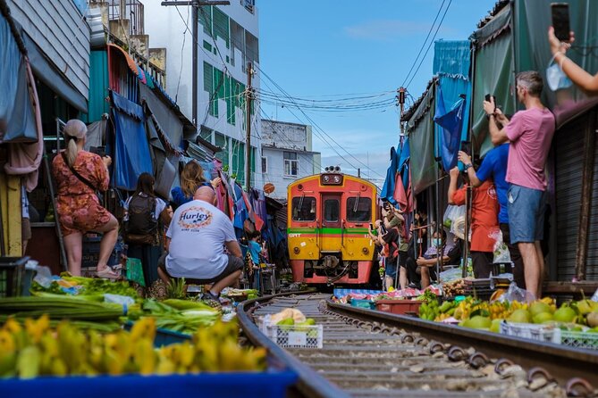 Amphawa Floating Market & Maeklong Railway Train Market Tour - Sunset on the canal and fireflies after dark