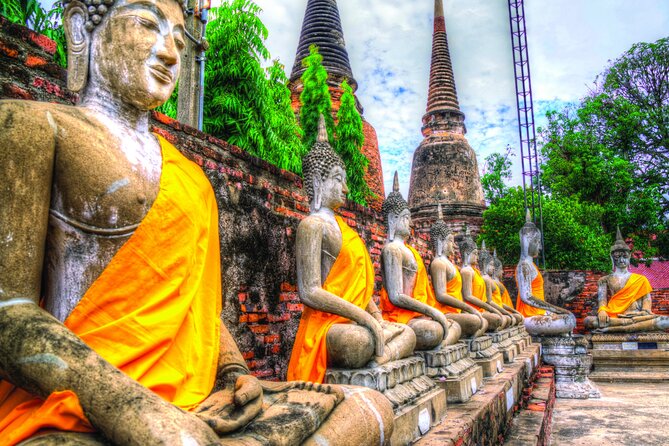 Ayutthaya Sunset Boat & UNESCO Temples: Multi-language private tour from Bangkok - Wat Mahathat and the Buddha head in the tree