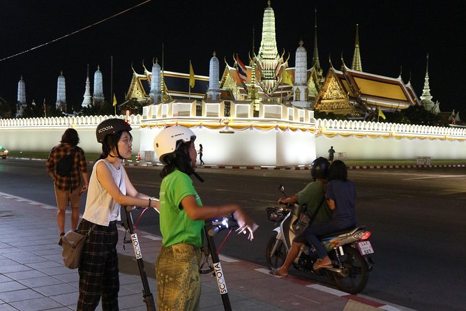 Bangkok at Night by Electric Scooter - The Grand Palace lit up from outside