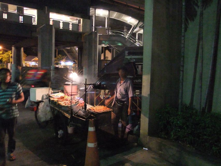 Bangkok by Night Cycling Tour with Street-food Meal - Along the Chao Phraya toward the lit skyline
