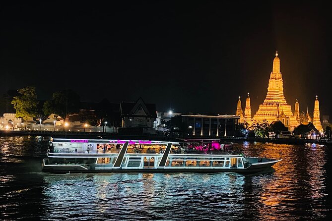 Bangkok Chao Phraya River Sunset Cruise Tour Admission Ticket - Wat Arun glowing beside the river