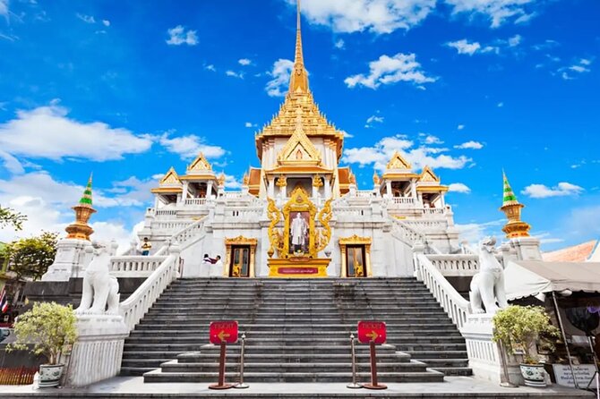 Bangkok City Tour with Guided Temple Visits and Shared Transfers - Gems Gallery changes the tone of the afternoon