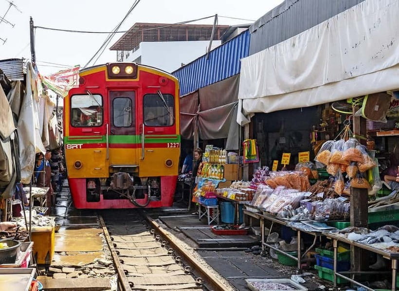 Bangkok: Floating Market & Railway Market with Hotel Pick Up - What the Maeklong train moment feels like