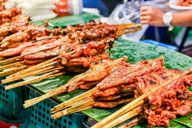 Bangkok: Floating Market & Train Market with Train/Boat ride - Damnoen Saduak Floating Market: colorful, busy, and touristy