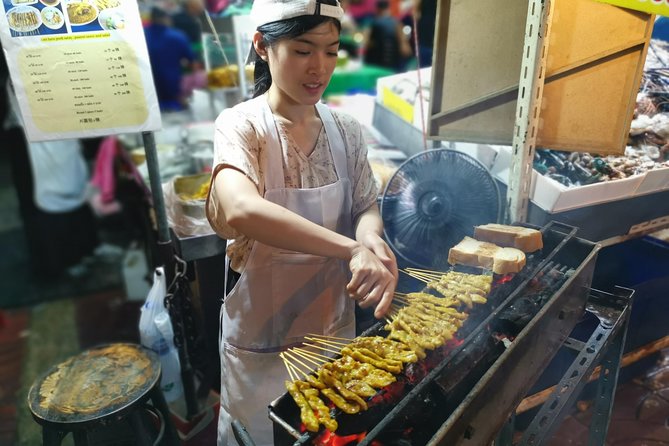 Bangkok Food Tour By Night - Street scenes, temples, and the practical side of the walk