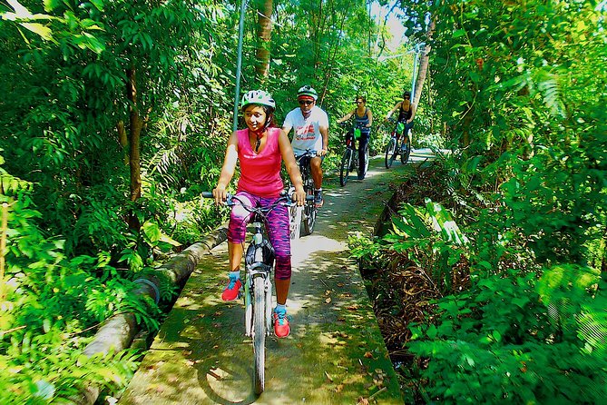 Bangkok Green Oasis 4-Hour Bike Tour with Boat Ride - Bang Krachao’s lanes, homes, and elevated paths