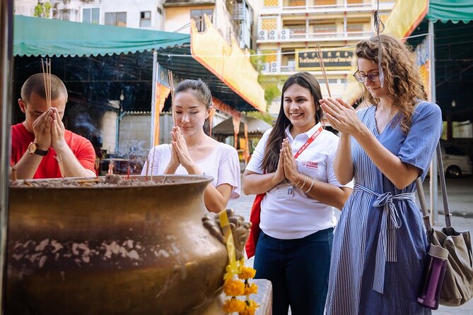 Bangkok Hidden Gems: Talad Noi, Chinatown & Street Food Tour - Entering Chinatown as the afternoon turns to evening