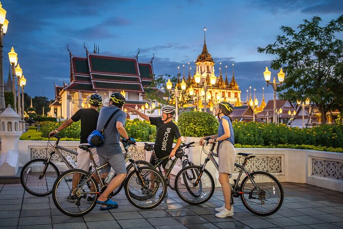 Bangkok: Night Bike Tour with Temples & Flower Market Visit - Thonburi, Wat Rakang, and the view of Wat Arun