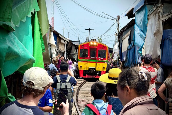 Bangkok: Private Floating Market and Train Market - Riding the local train through rural Thailand
