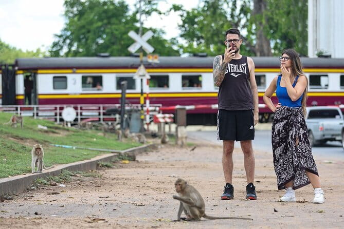 Bangkok to Ayutthaya Lopburi Monkey Temple, Largest Buddha Tour - Wat Mahathat and the Buddha head in the roots