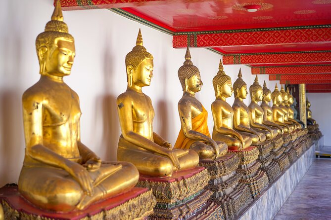 Bangkok Wat Pho and Flower Market Historical Walking Tour - Traditional Thai dress and Wat Arun
