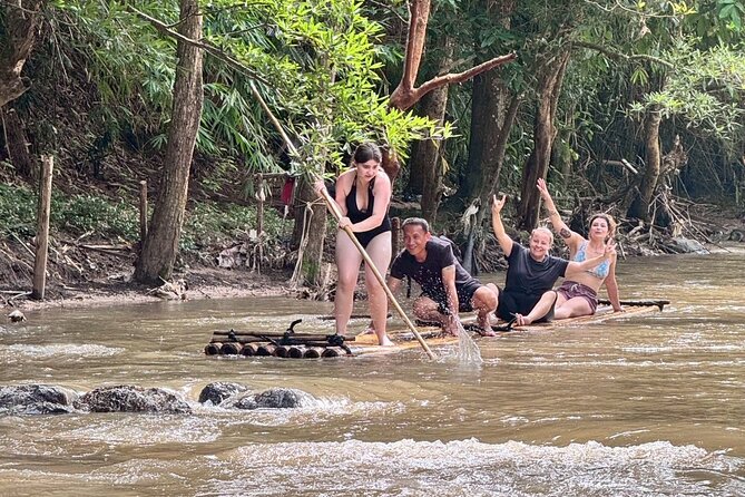 Chiang Mai 1 Day: Elephant Sanctuary, Waterfall & Bamboo Rafting - Bamboo rafting through the Thai countryside