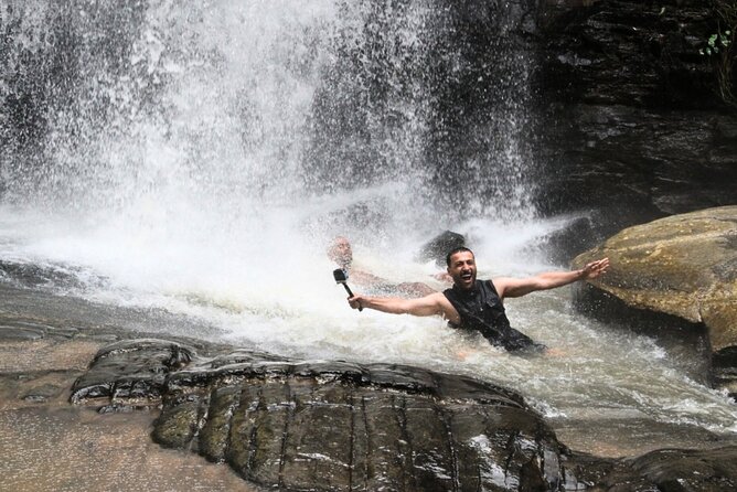 Chiang Mai Adventure ATV Secret Waterfall and Bamboo Rafting - Cooling off at the secret waterfall