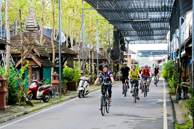 Chiang Mai Countryside Guided Bike Tour - Riding through orchards, canals, and rice fields