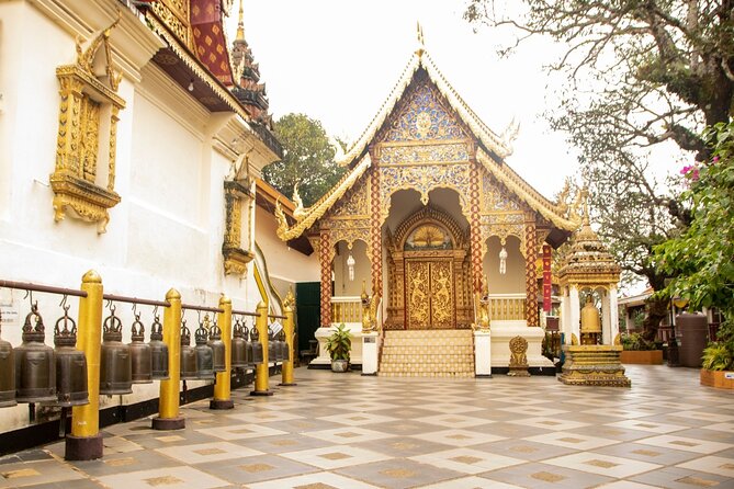 Chiang Mai - Doi Suthep Temple & Wat Pha Lat Hike - The red songthaew is part of the experience