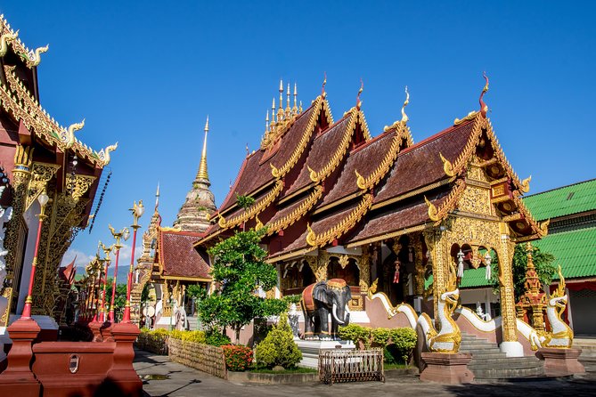Chiang Mai: Historic Old City Bike Tour - Morning or Night - Wat Inthakhin and the Three Kings Monument