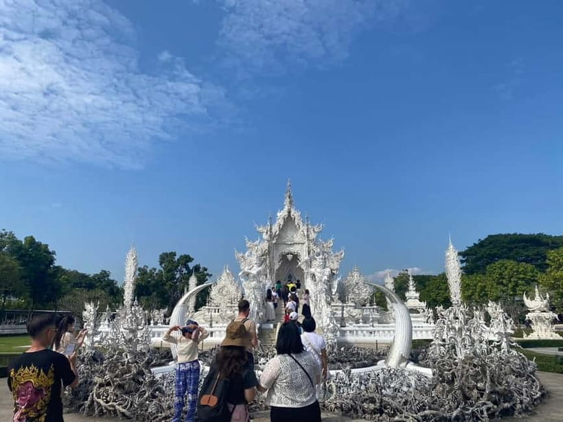 Chiang Rai: 3 Temples, Long Neck Village & Lalitta Café - Big Buddha offers Chiang Rai from a hilltop