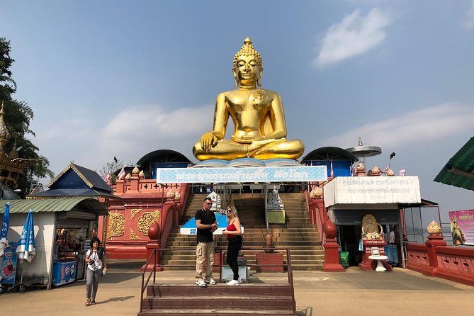 Chiang Rai One Day: Golden Triangle, Laos Border, Long Neck Tribe - Wat Rong Khun is the visual centerpiece