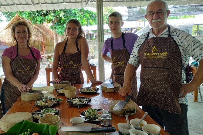 Cooking class in organic garden and local market tour ThaiCottage - Eating what you made in family style