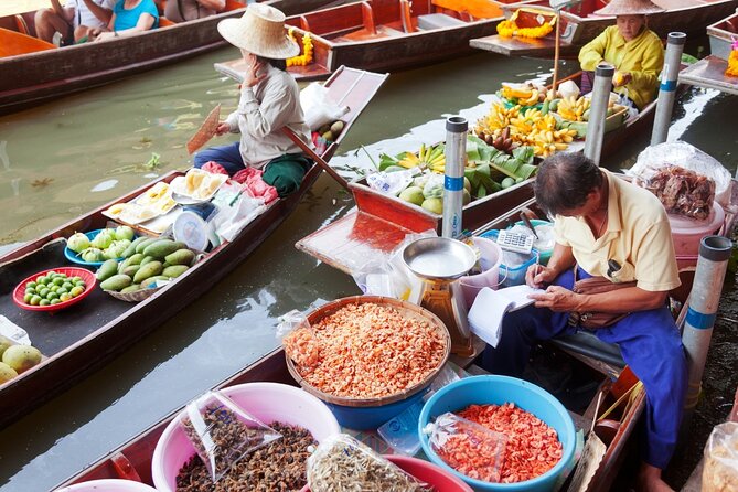 Damnoen Saduak Floating Market and Maeklong Railway Market Tour - Maeklong Railway Market: the train is the show