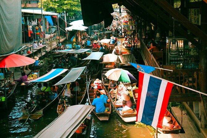 Damnoen Saduak Floating Market & Maeklong Railway Market Tour From Bangkok - Mae Klong Railway Market and the slow train