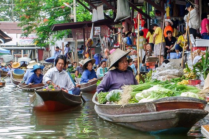 Famous Markets Tour: Maeklong Railway & Damnoen Saduak Floating - Who will get the most from this outing?