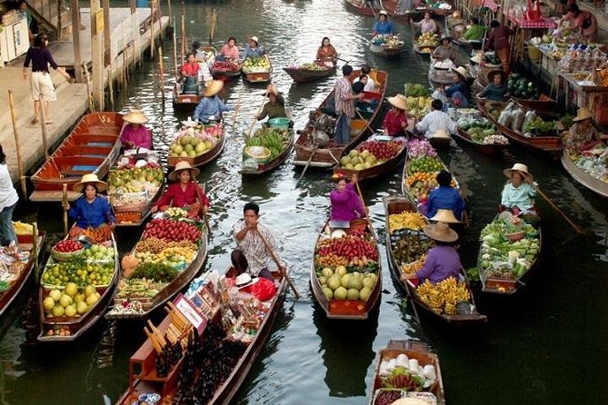 Floating Market Damnoen Saduak and Meklong Railway Market: Half Day Tour - Maeklong Railway Market and the train timing