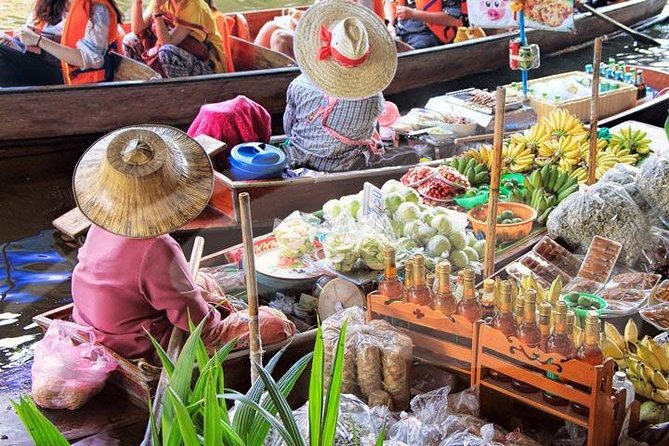 Floating Markets and Bridge on River Kwai Tour from Bangkok - Buying at the floating market