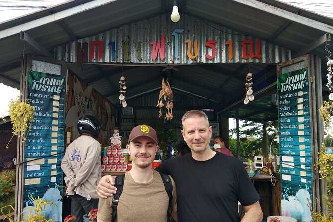 Floating & Railway Markets and Erawan Waterfall [Optional Luxury] - Riding the train into Mae Klong Railway Market