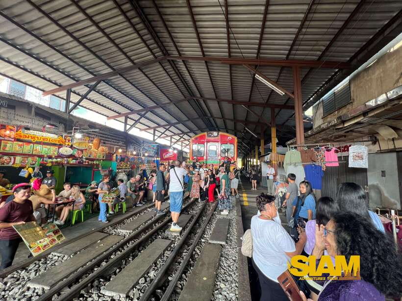From Bangkok:Damnoen Floating Market and Railway Market Tour - Maeklong Railway Market and the train passing through
