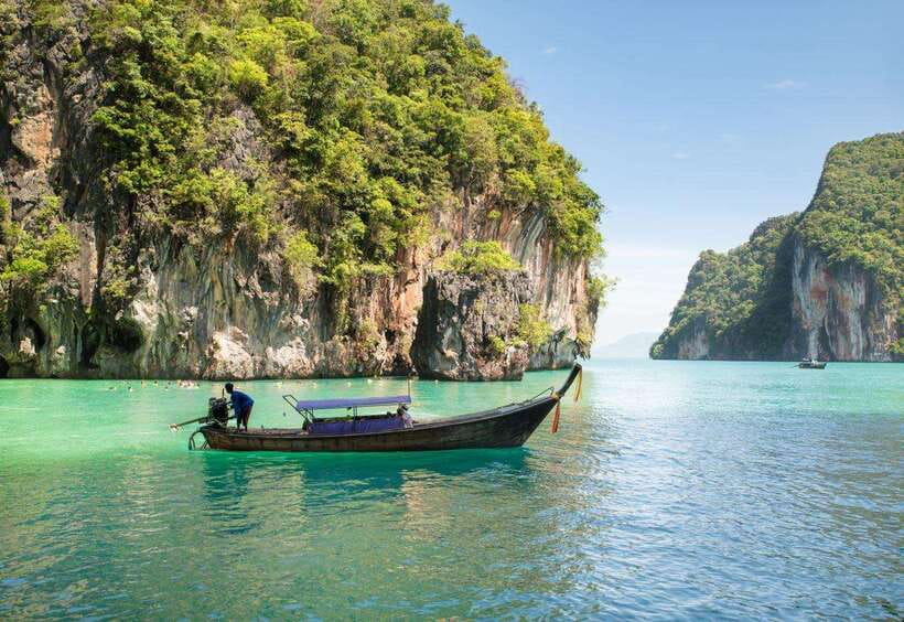 From Phi Phi islands: Phi Phi, Maya Area by longtail Boat - Longtail boats turn the ride into part of the day