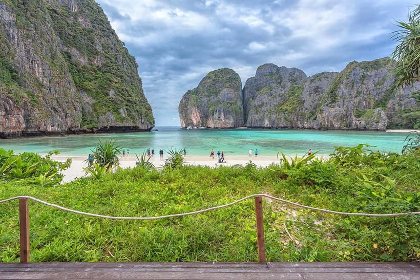 From Phi Phi: Sunset & Plankton Swim Tour By Speedboat - Viking Cave from the water
