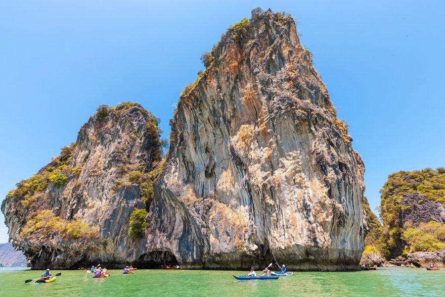 From Phuket: Phang Nga Bay and Canoeing Tour by Big Boat - Hong Island: quiet water inside the cliffs