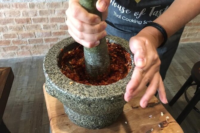 Hands-on Thai Cooking Class & Market Tour in Sukhumvit - Price, group size, and what you receive