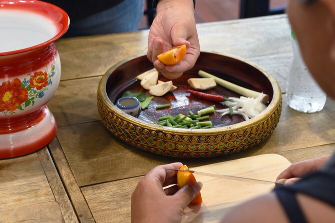 Hands-on Thai Cooking Class & Market Tour in Sukhumvit - The Sukhumvit market visit and school entrance