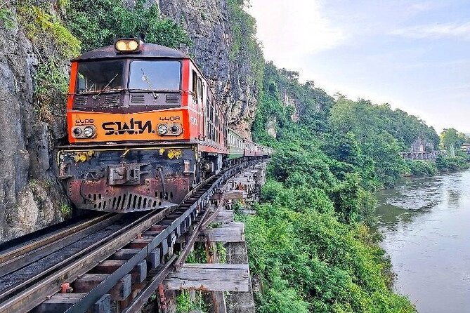 Kanchanaburi Day Trip: WWII Death Railway & Erawan Falls - Walking across the River Kwai Bridge