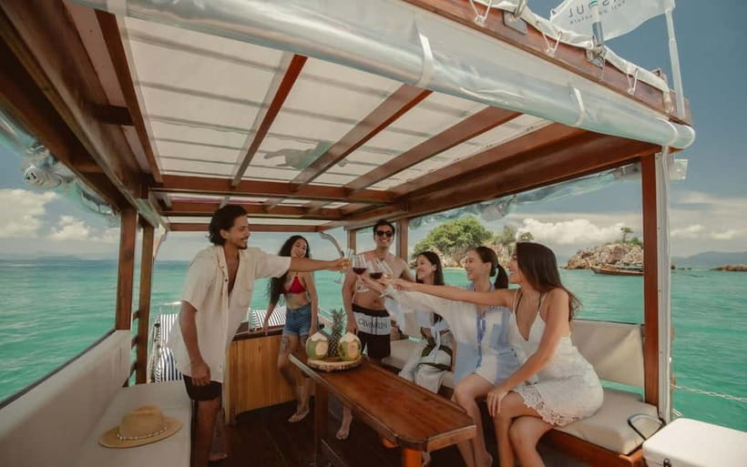 Krabi: 7 Island Tour by Luxury Longtail Boat with Snorkeling - Leaving the pier and passing Railay Bay