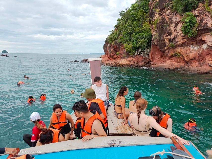 Krabi: Hong Island Tour by Longtail Boat with Kayak Option - Entering Hong Lagoon through the limestone gap