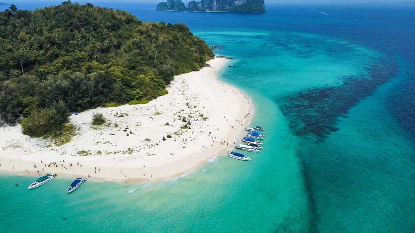 Krabi: Phi Phi Islands Speedboat Tour with Buffet Lunch - Two early snorkeling stops in clear Andaman water