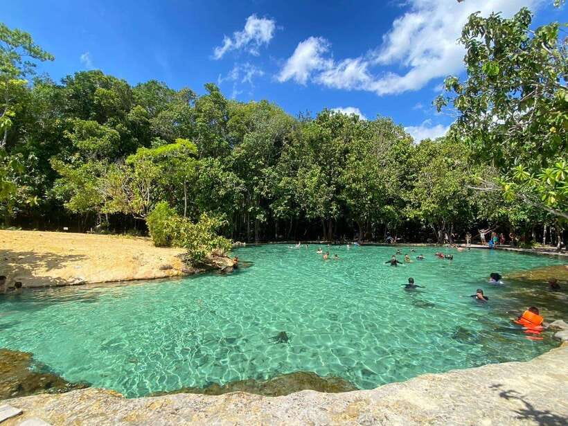 Krabi: Tiger Cave Temple, Emerald Pool and Hot Springs Tour - Hot Springs Waterfall: warm water in a natural setting