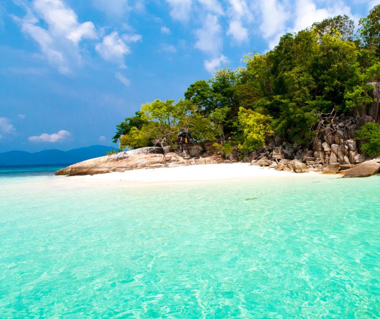 Lipe: Longtail Boat Snorkeling to Outer Islands Program B - Hin Ngam and the black-stone shoreline