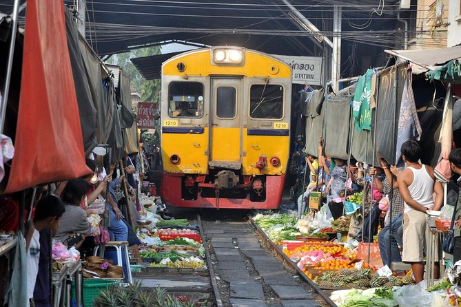 Maeklong & Damnoen Saduak Markets: Railway & Floating Market Tour - Meeting point, pickup, and the end of the day