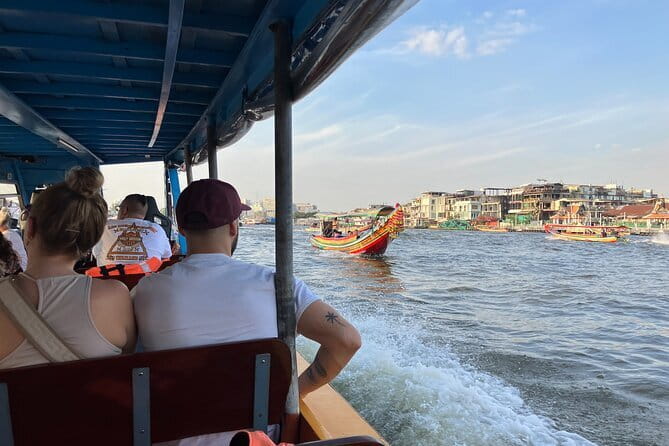 Maeklong Railway and Damnoen Saduak Floating Market Tour - What the $38 price really covers