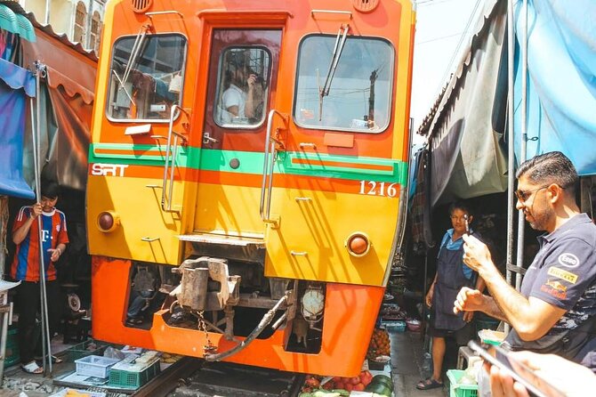 Maeklong Railway Market and Damnoen Saduak Floating Market Tour From Bangkok - Why the train market is the real star