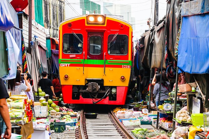 Maeklong Railway Market and Damnoen Saduak Floating Market Tour From Bangkok - Damnoen Saduak by long-tail boat